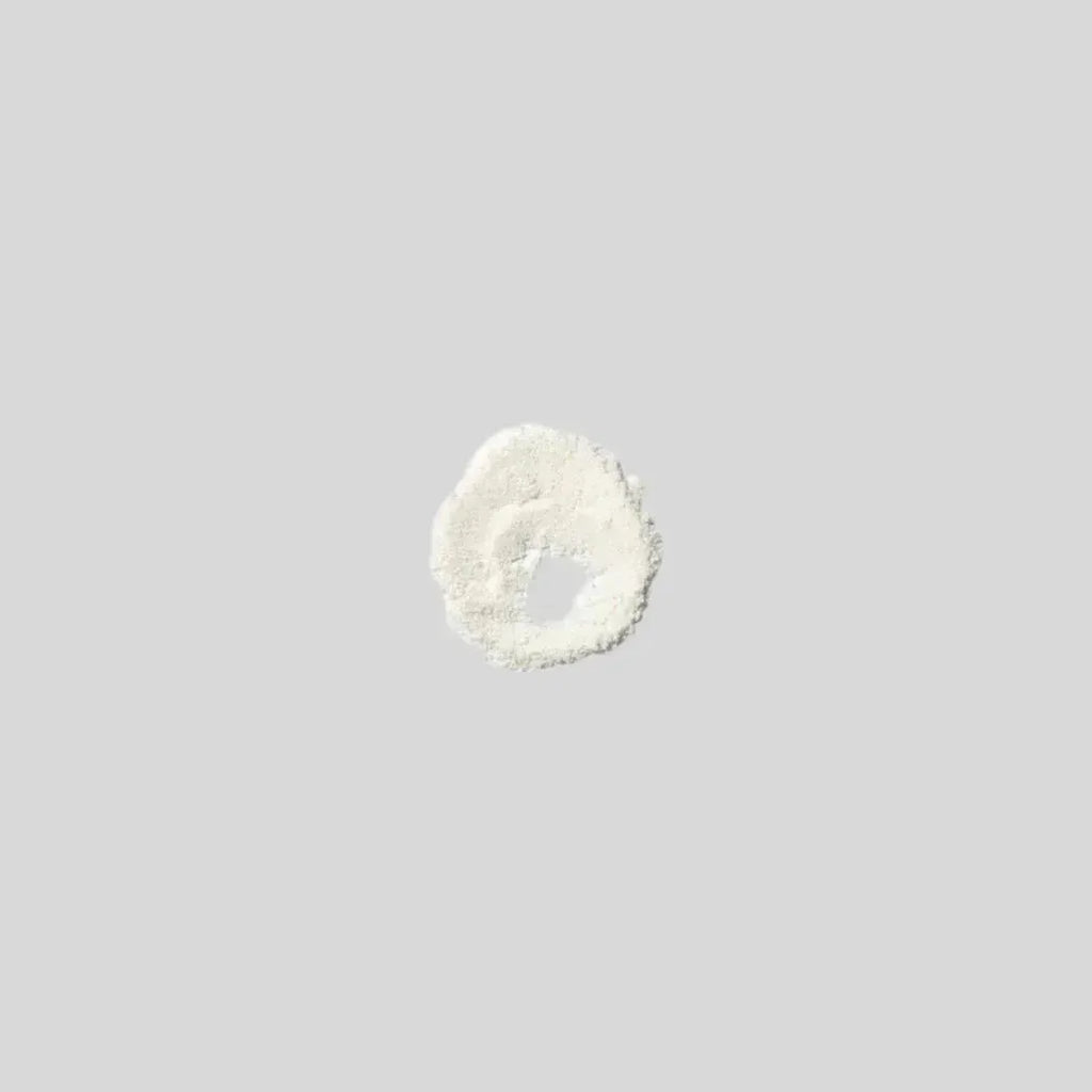 White protein powder on gray background, Super Muscles Nutrition supplement product - The Mighty Pre Workout Sour Watermellon - The Mighty Pre Workout Mango Madness - The Mighty Pre Workout Mango Madness