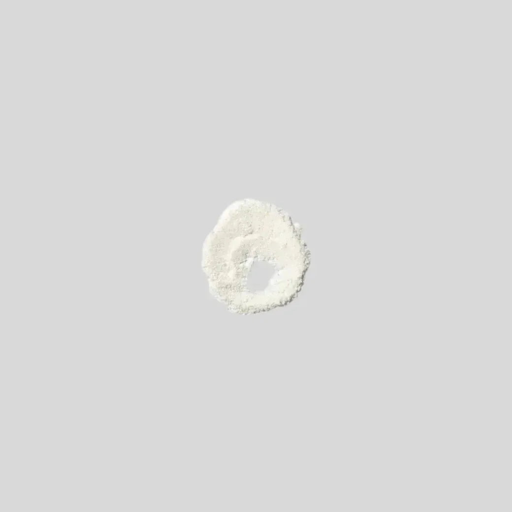 White protein powder on gray background, Super Muscles Nutrition supplement product - The Mighty Pre Workout Sour Watermellon - The Mighty Pre Workout Mango Madness - The Mighty Pre Workout Mango Madness
