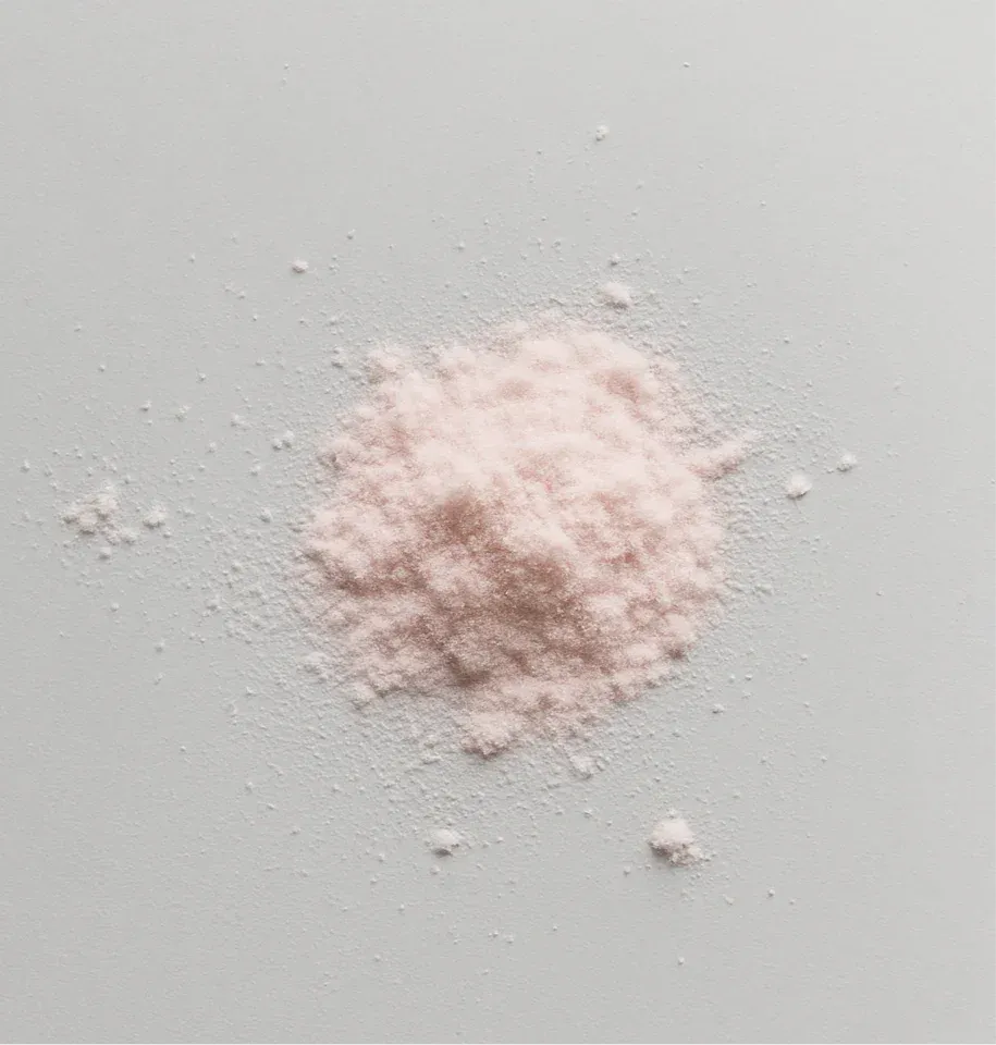 Pink nutrition supplement powder on white background, Super Muscles Nutrition product - Creatine Monohydrate Juicy Guava - Creatine Monohydrate Juicy Guava